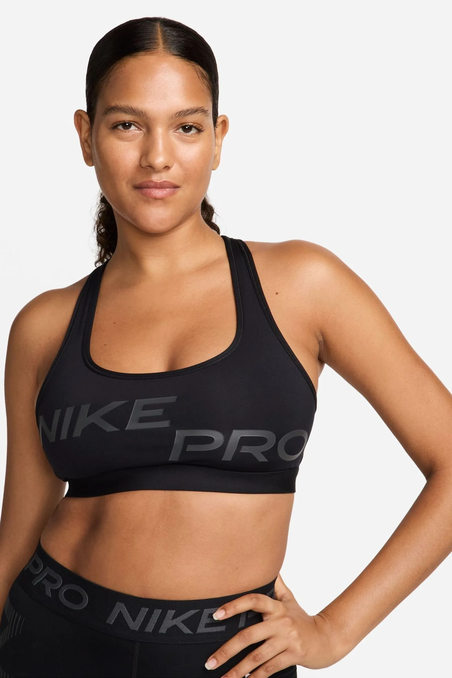 Nike Pro - Reggiseno sportivo sostegno leggero con logo e grafica senza imbottitura